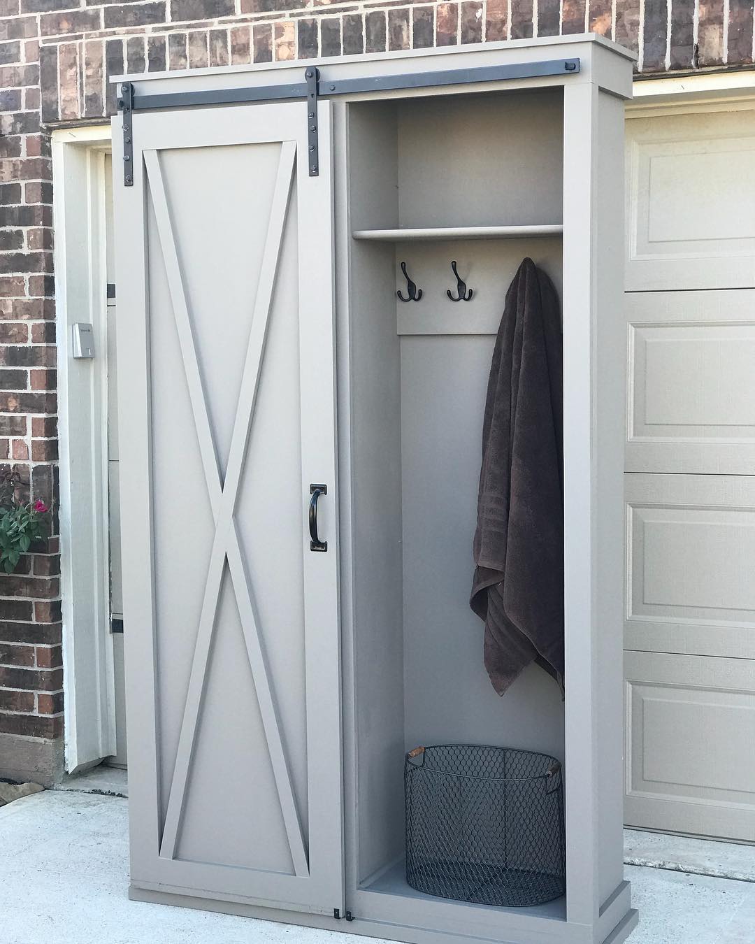 Distressed white deals barn door cabinet